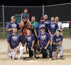 Men's softball team in their Community First t-shirts